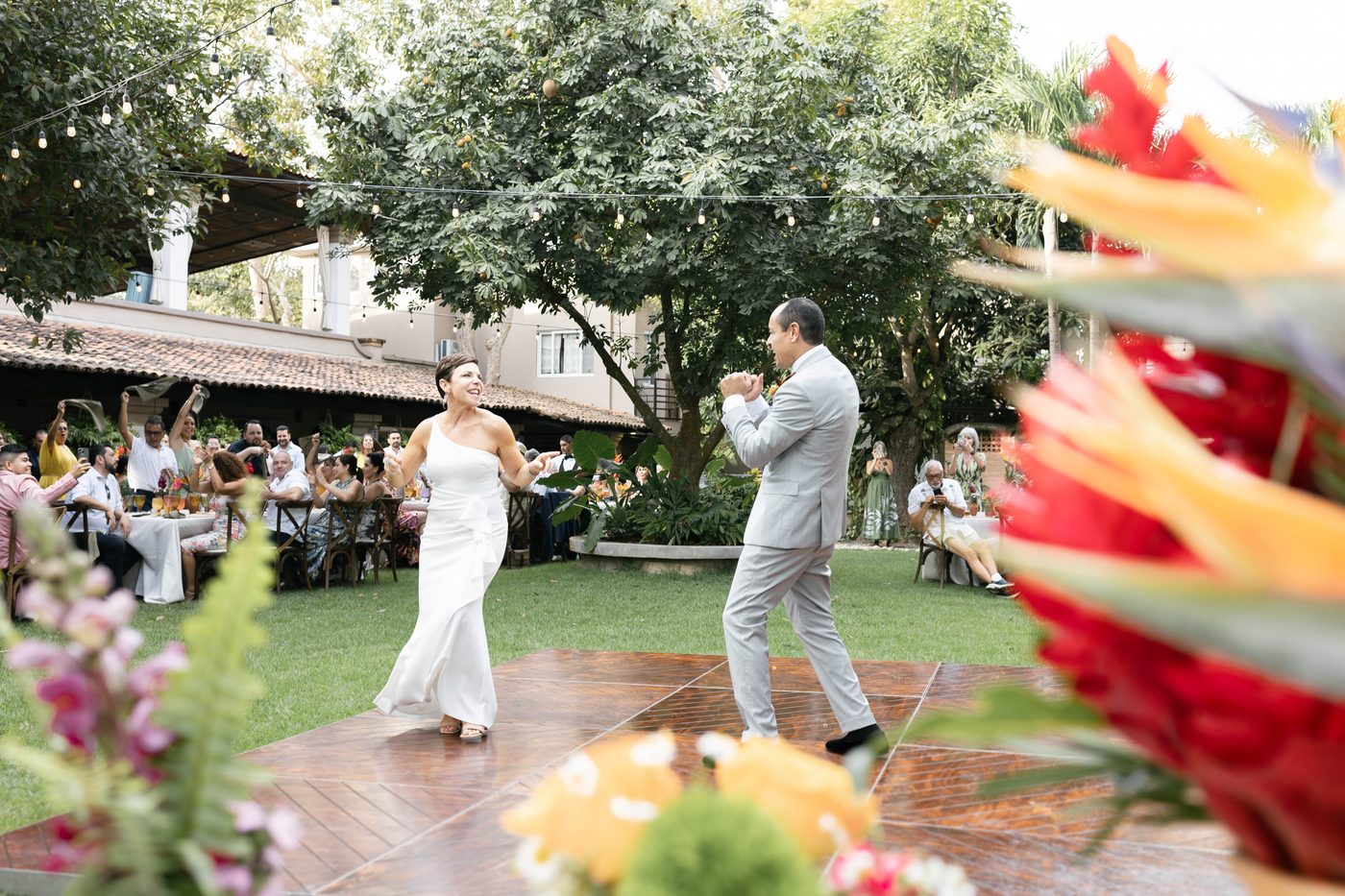 Couple first dance on outdoor dance floor