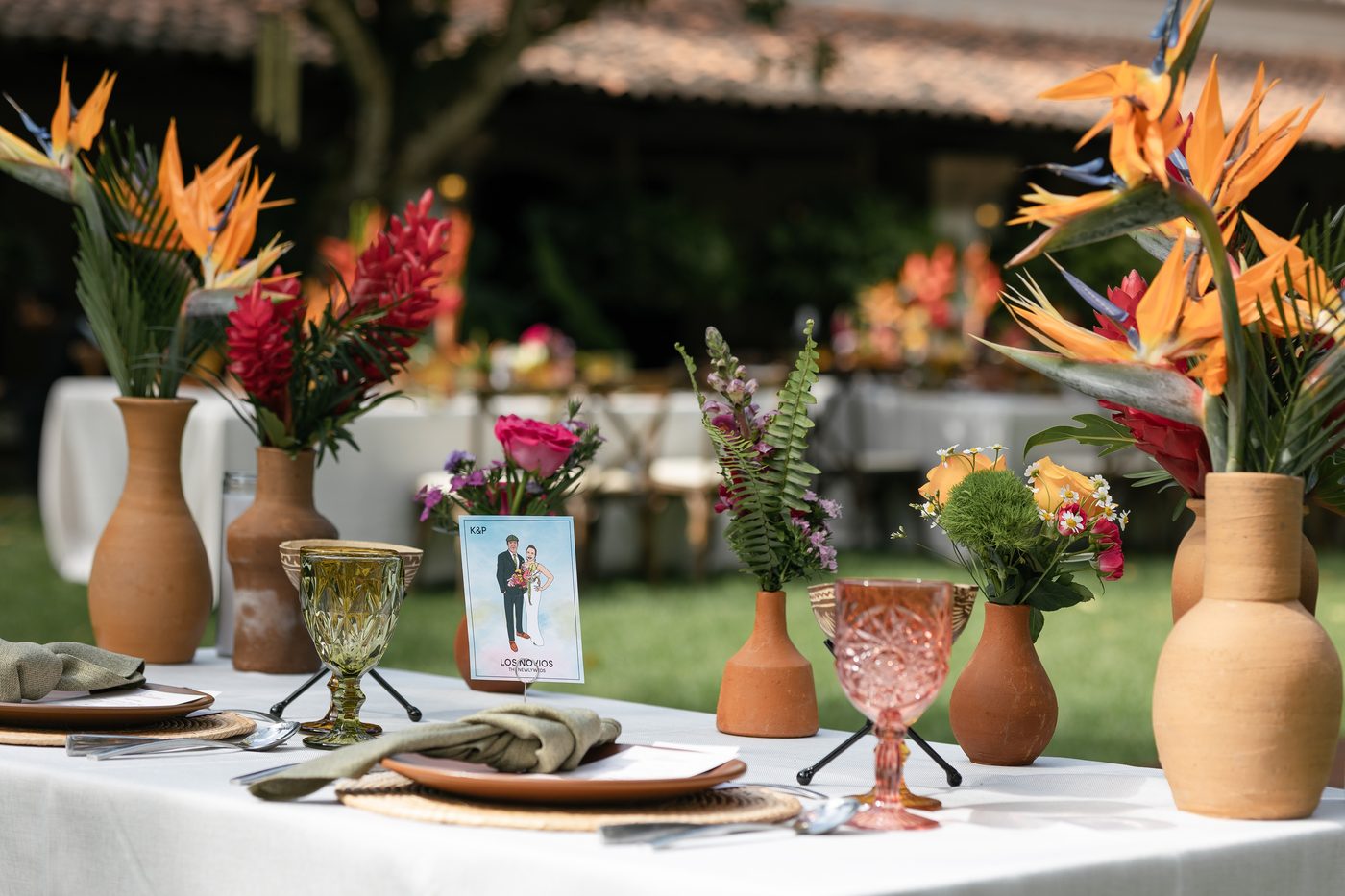 Tropical table with bird of paradise flowers